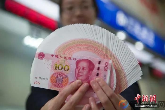 个人存取现金5万元以上要登记，啥信号？(图1)
